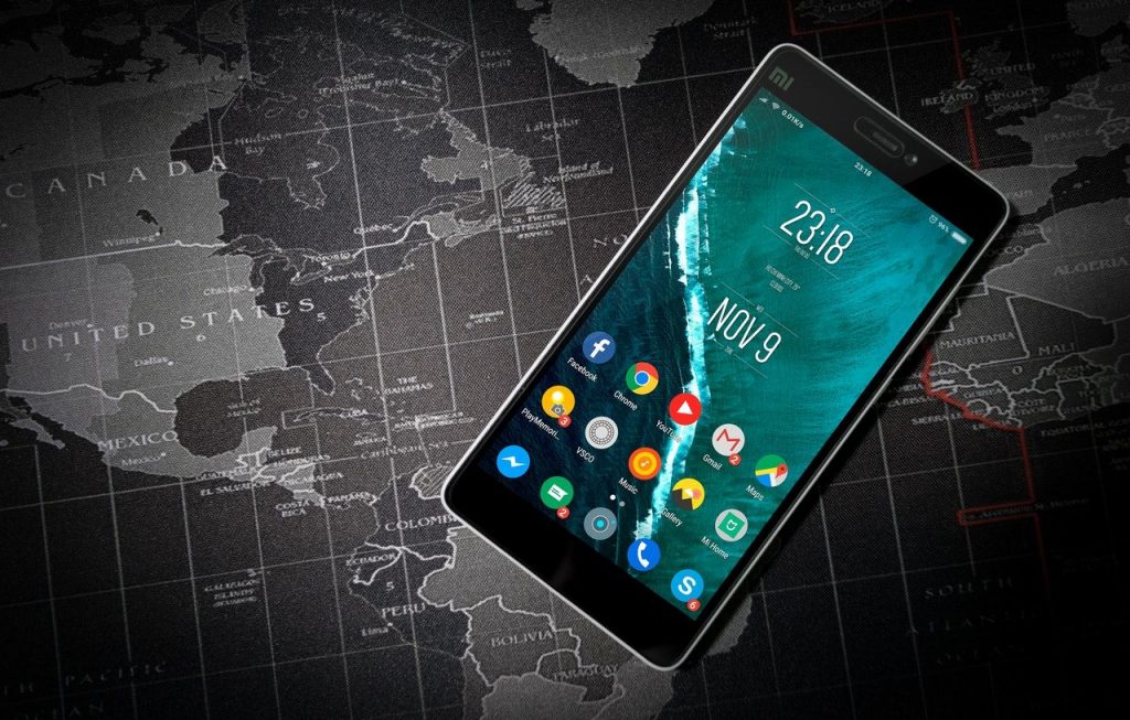 Android Smartphone with apps on top of map.